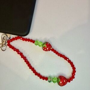 Cell phone wristlet from The Charm Hut works on any phone case